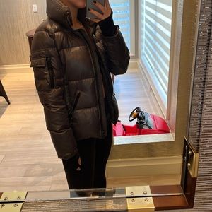 Gunmetal puffer jacket. Great length and minor scuff marks.